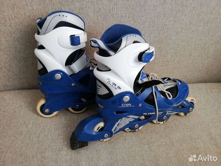 Роликовые коньки