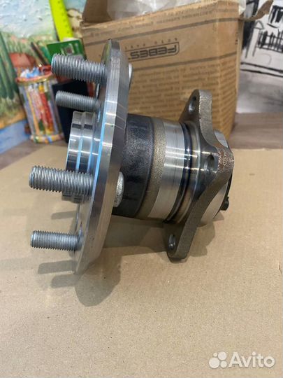 Новая ступица в сборе задняя левая на Toyota Camry