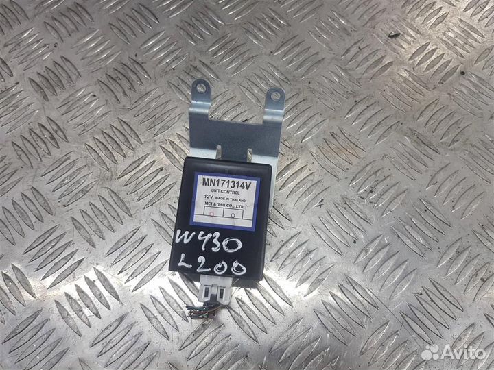 Блок управления полным приводом Мицубиси Л200 MN1