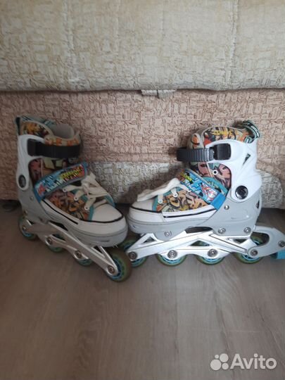 Коньки роликовые
