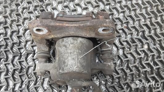 Суппорт тормозной задний левый toyota RAV 4 ZSA3