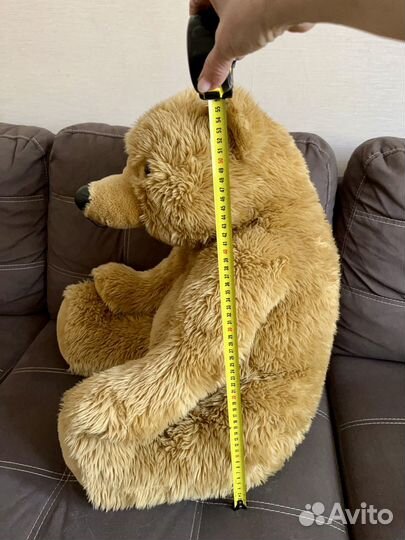 Большой бежевый медведь