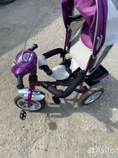 Трехколёсный велосипед с ручкой