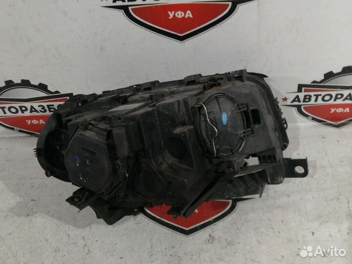 Фара левая галоген BMW X3 E83 06-10