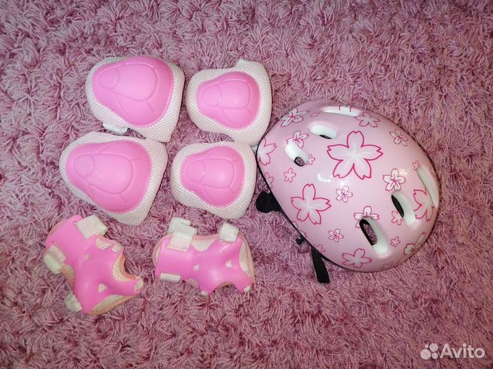 Роликовые коньки