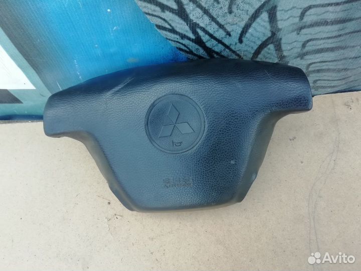 Подушка безопасности накладка В руль Mitsubishi La