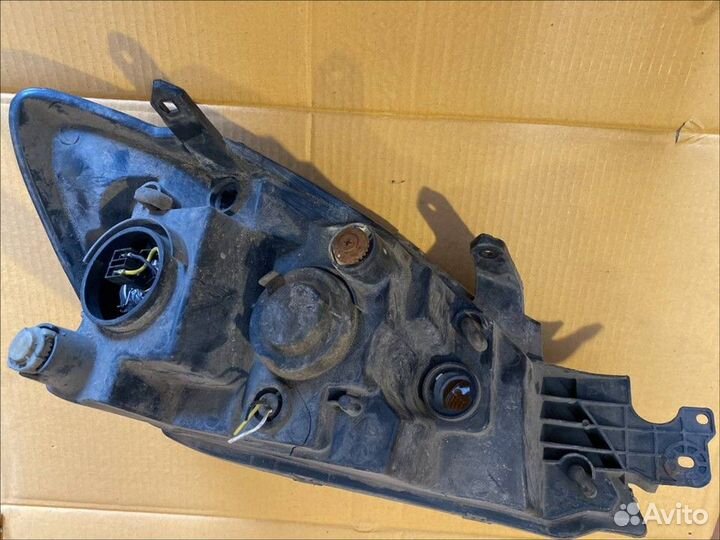 Фара передняя левая Mitsubishi Lancer