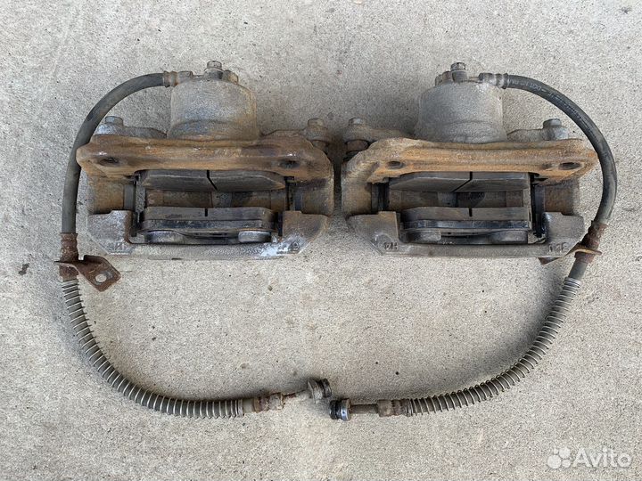 Суппорт передний левый Kia Cerato 3