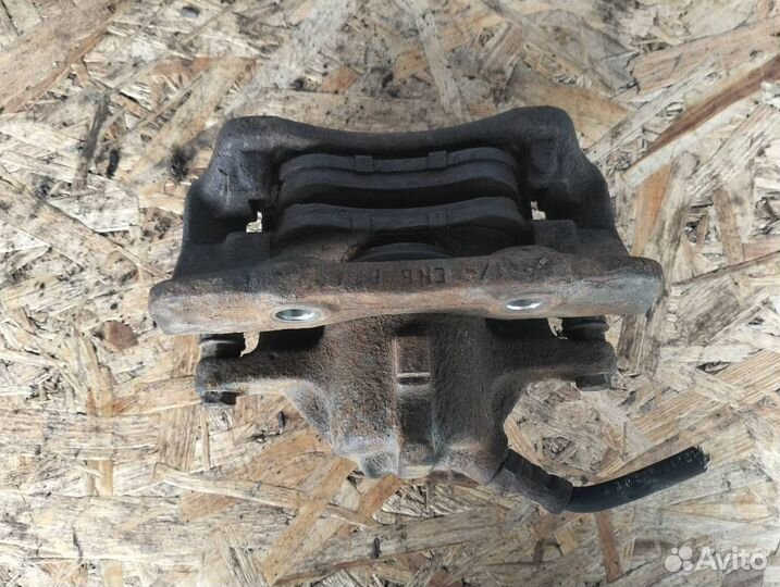 Суппорт тормозной передний левый Citroen Berlingo