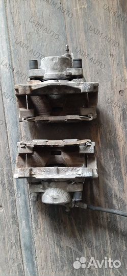 Суппорт тормозной передний Volvo XC70