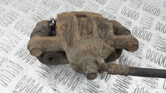 Суппорт тормозной задний правый KIA sportage 2 (EM