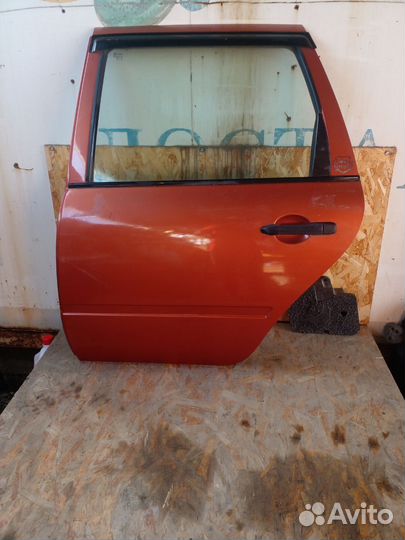Дверь задняя левая Калина Универсал