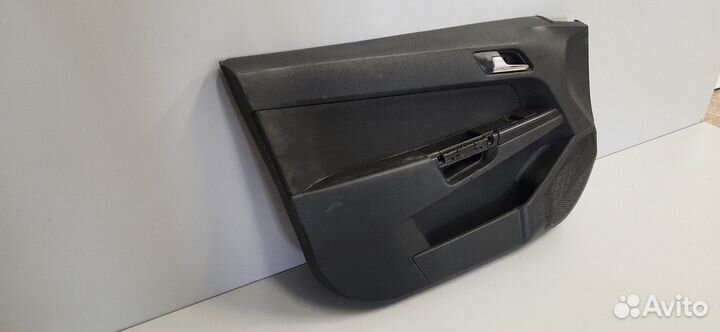 Обшивка двери передней левой Opel Astra H / Family