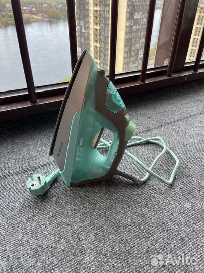 Гладильная доска и утюг