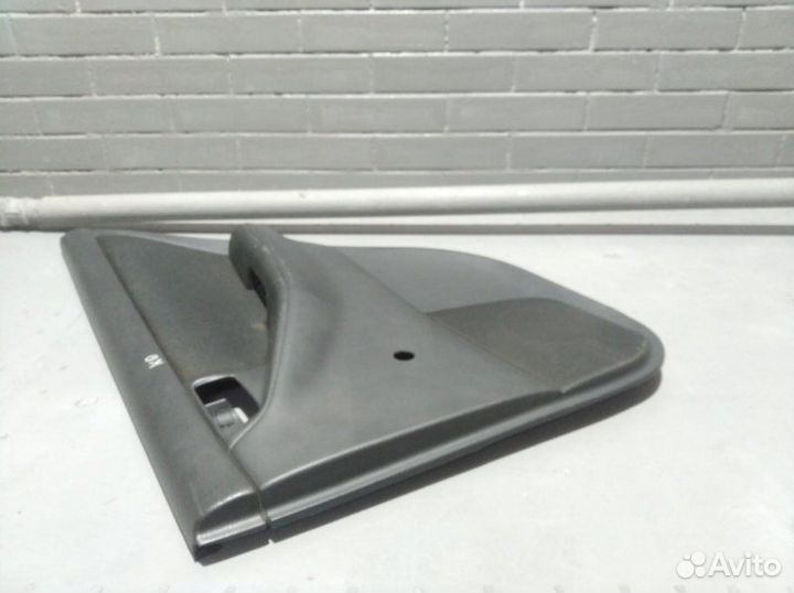 Обшивка боковой двери задняя правая Toyota Corolla