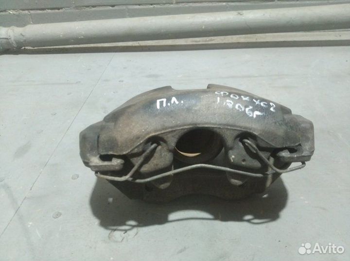 Суппорт тормозной передний левый Ford Focus 2