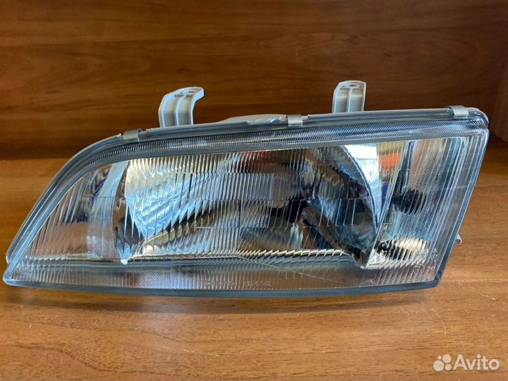 Фара левая Nissan Primera P11 1996-1999