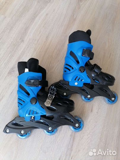 Роликовые коньки