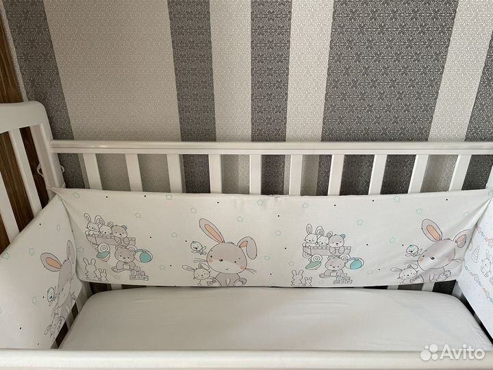 Детская кроватка с поперечным маятником