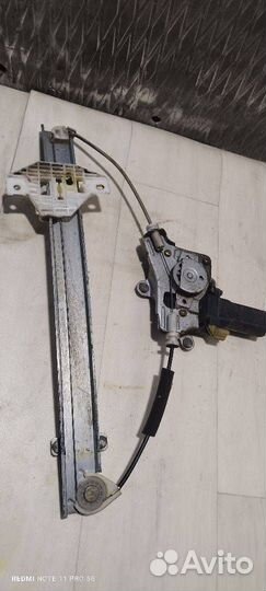 Стеклоподъемник электрический задний левый