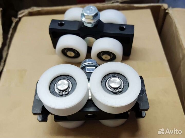 Тележки роликовые