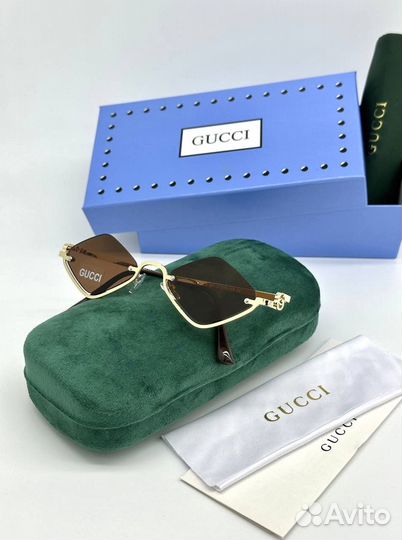 Солнцезащитные очки Gucci