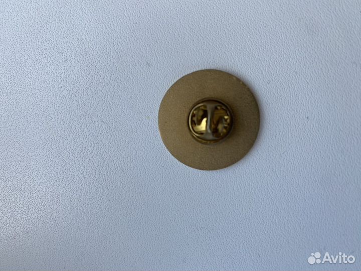 Значoк century 21