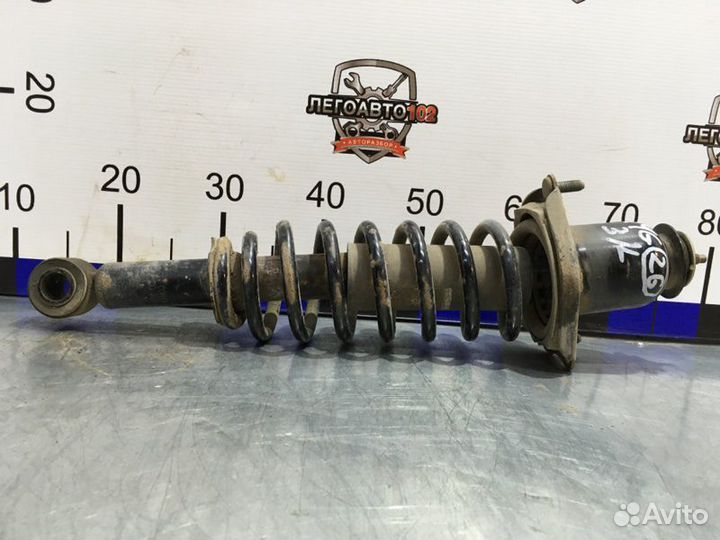 Стойка подвески задняя левая Geely Emgrand Ec7