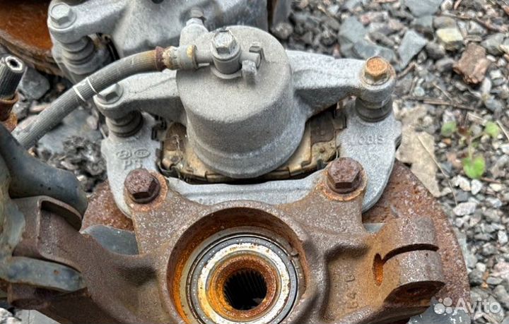 Суппорт тормозной передний левый Kia Soul PS G4NC