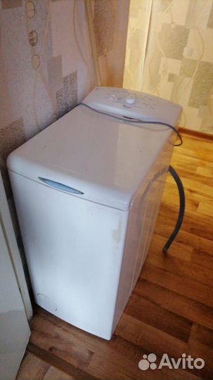 Стиральная машина с вертикальной загрузкой