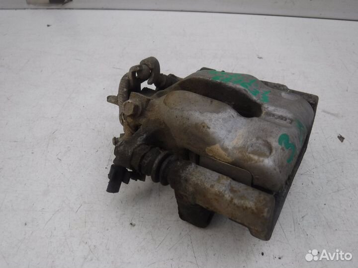 Суппорт тормозной задний левый Opel Astra H 2004