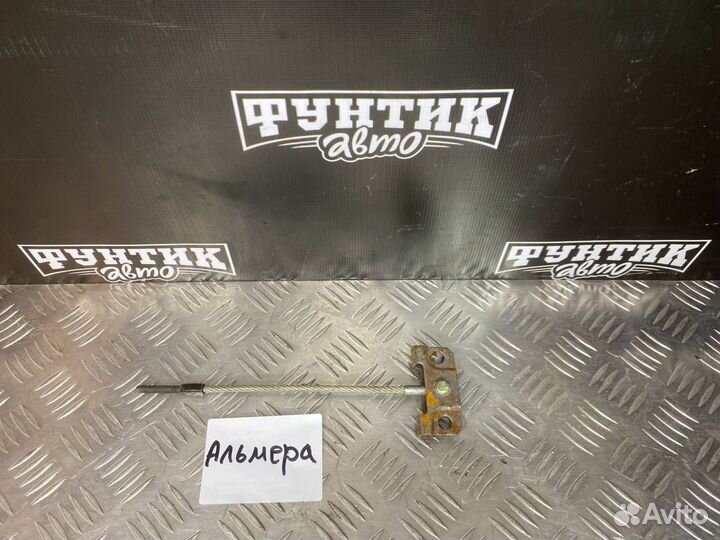 Трос стояночного тормоза центральный Nissan Almera