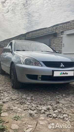 Mitsubishi Lancer 1.6 МТ, 2006, 242 000 км