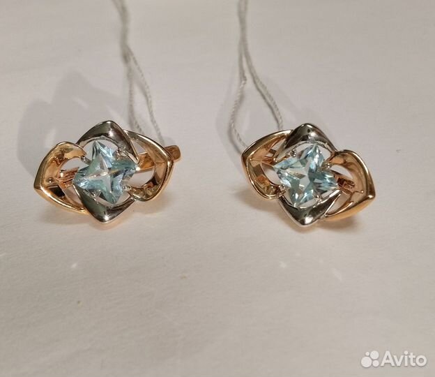 Золотые серьги с камнем