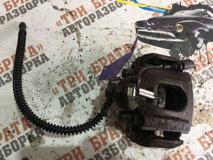 Фольксваген Туарег Суппорт задний Лев