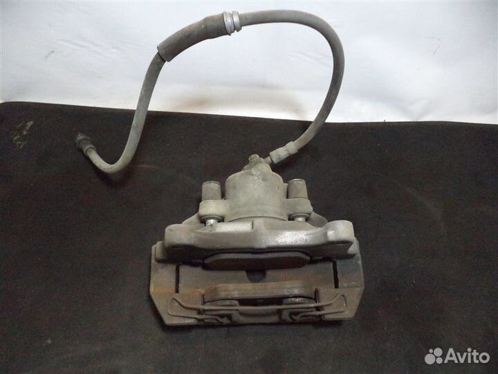 Суппорт передний правый Volkswagen Passat Variant