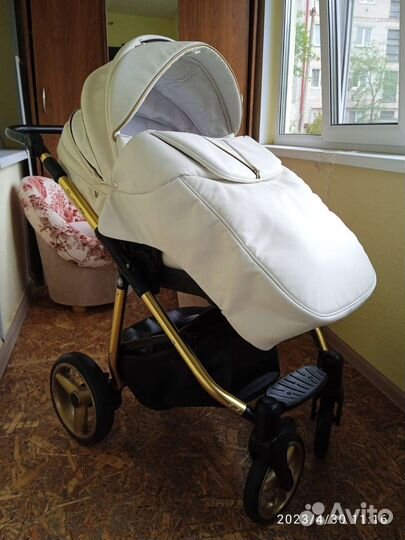Коляска адамакс