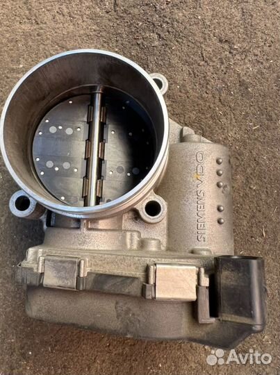 Дросселньая заслонка Audi 06E133062C
