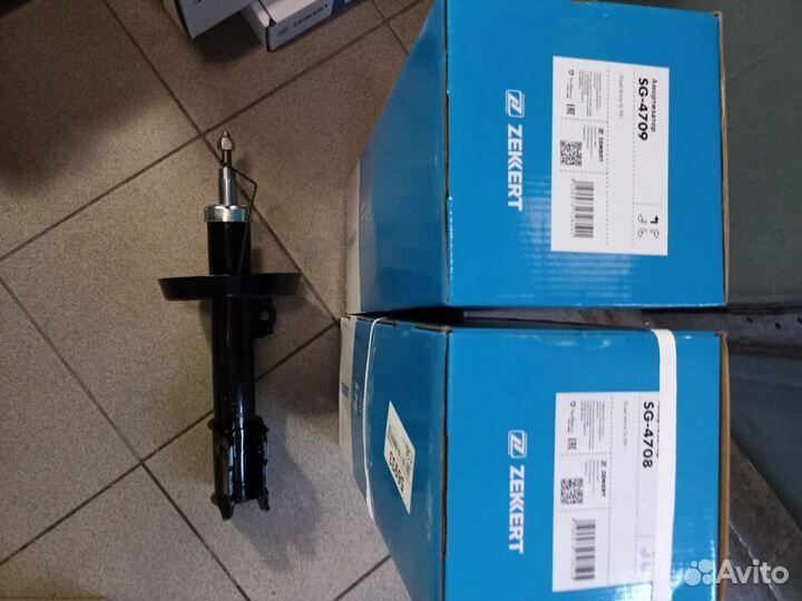 Амортизатор передний левый Opel Astra G