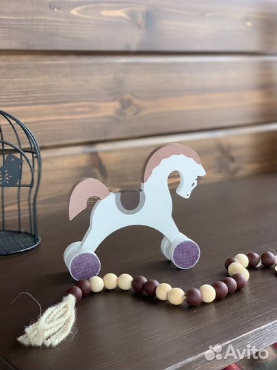 Игрушка-каталка Лошадка