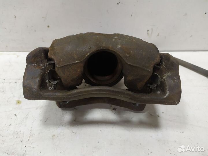 Суппорт тормозной передний левый Almera (G15) 2013