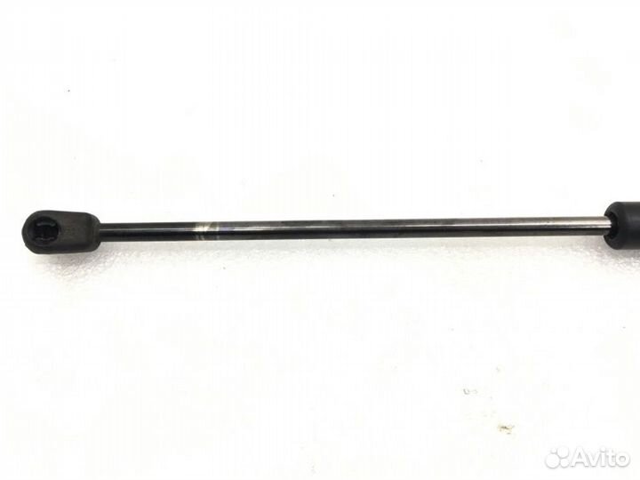 Амортизатор двери багажника левый Ssangyong Rexton