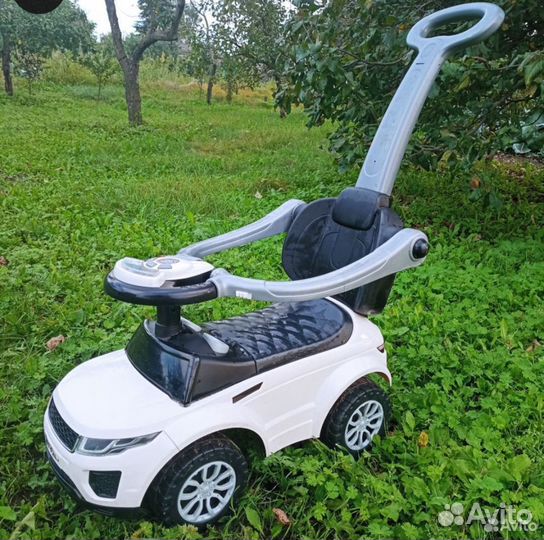Машинка каталка с ручкой