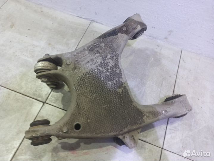 Рычаг задний нижний левый