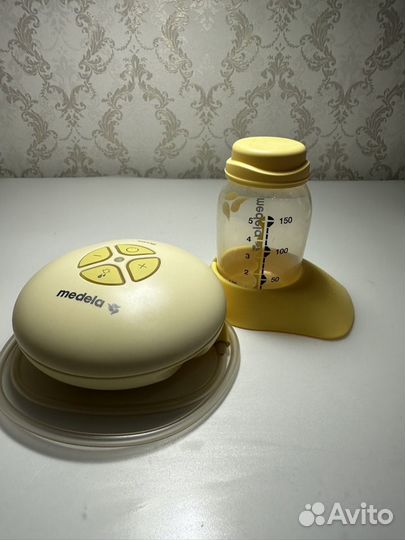 Молокоотсос medela swing