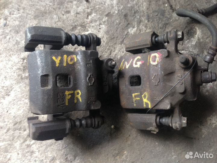 Суппорт передний R Nissan Wingroad Y10