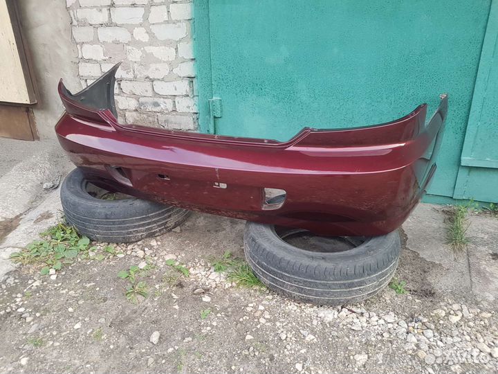 Бампер задний kia spectra