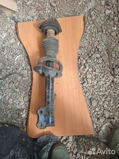 Kia sportage 3 амортизатор левый