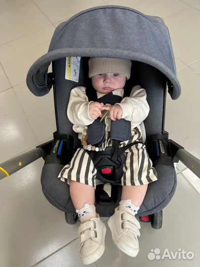 Коляска автолюлька doona