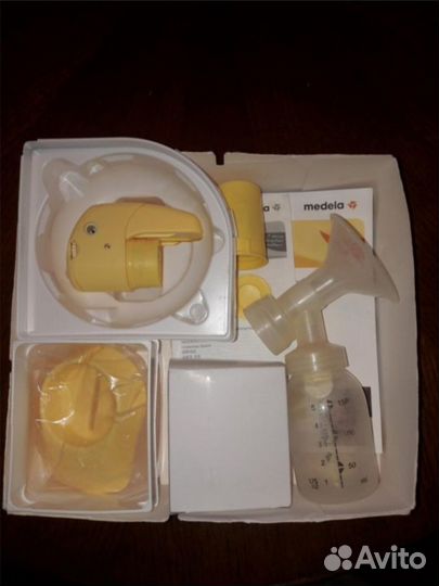 Молокоотсос medela электрический